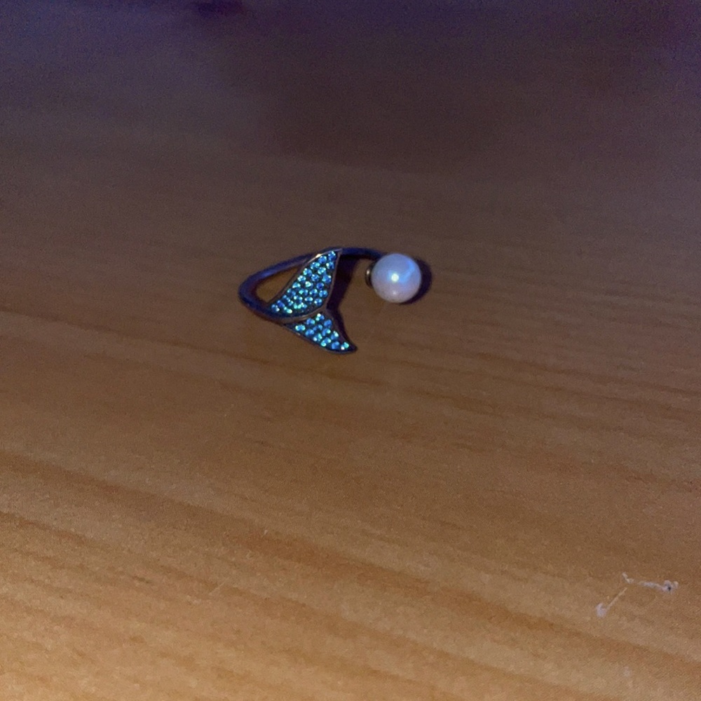 A real pearl blue dolphin ring